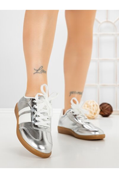 Anderina Women's silver sports shoes made of ecological Leather Arivela