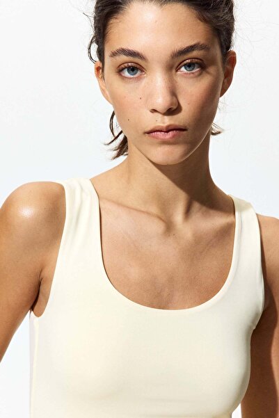 H&M سترة من الألياف الدقيقة