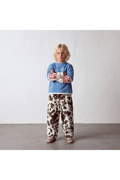 Çocuk sweatshirt ve kamuflaj desenli pantolon