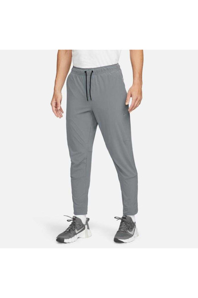 Nike Unlimited Erkek Dri-FIT Fermuarlı Paça Çok Amaçlı Pantolon