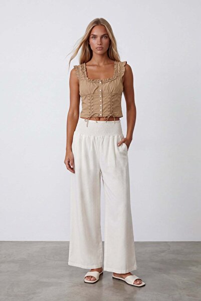 Trend Alaçatı Stili Women's ecru high-waisted trousers with elasticated waist...
