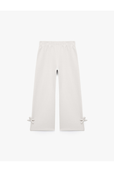 Koton Pantaloni de trening cu tiv larg, cu detaliu fundă