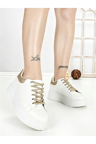 STEPHAN Women's gold sneakers made of eco- Leather Sarina