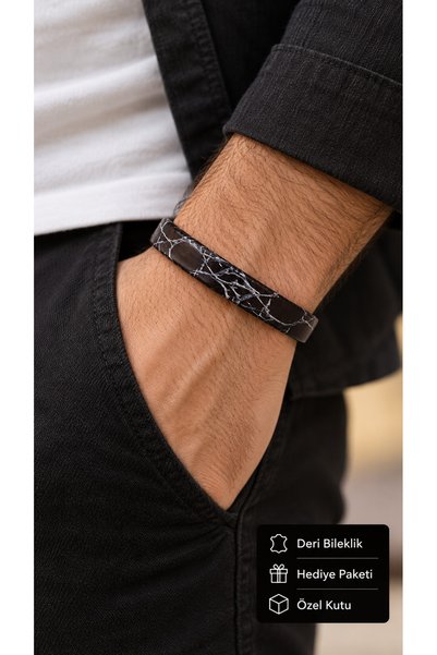HER ŞEY NOTA www.herseynota.com Falvori Stoneweb Brown Leather Men's Bracelet...