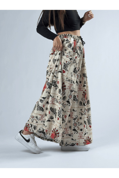 COCOPELLI Kelebek Paça Ayarlamalı Süper Oversize Krem Kadın Pantolon COC3367
