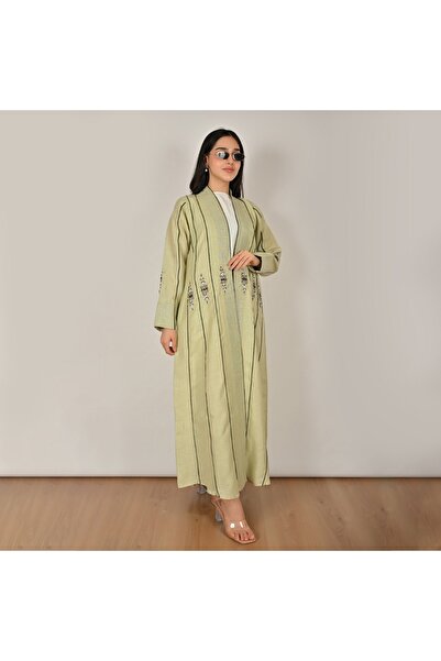 HAWRAA ABAYA عباية لف بلون اخضر باستيل بتفاصيل طولية مزينة بشك وتطريزات