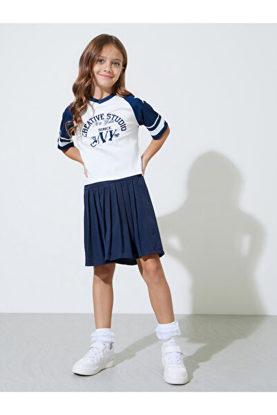 Styli Girls Graphic print Oversized T-Shirt and Solid Pleated Skirt Set