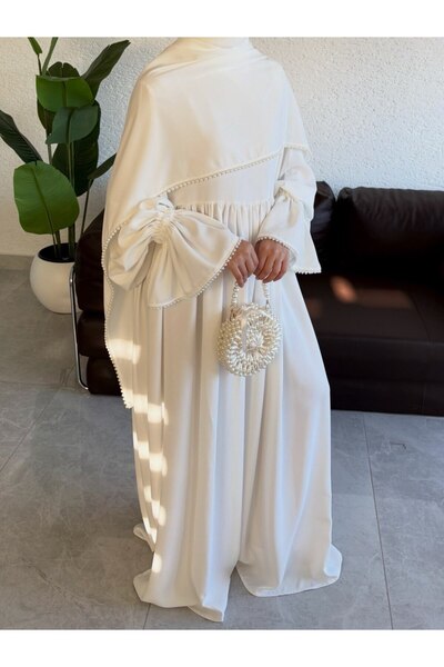 inci wears Adriana Crepe Robe Dress with Double Layered Sleeves and Pearl Shawl