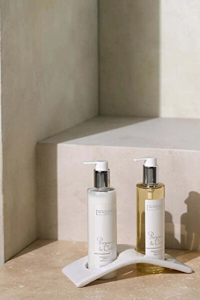 THE WHITE COMPANY حامل زجاجات الحمام من السيراميك من مورستون - أبيض