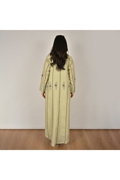 HAWRAA ABAYA عباية لف بلون اخضر باستيل بتفاصيل طولية مزينة بشك وتطريزات