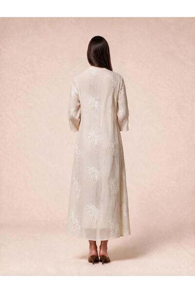 TOP CLOTHE جلابية بتطريز بارز وقصة انسيابية