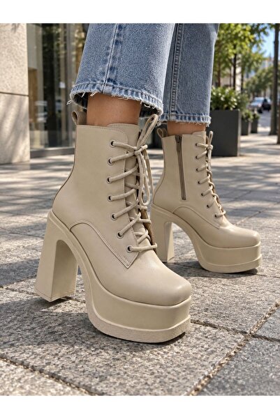 asmi shoes حذاء نسائي من ماركة Magret ذو أربطة وتفاصيل من الجلد الكريمي، بكعب...