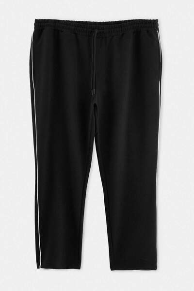 Trendyol Collection Plus Size Black Regular Cut Open Leg Sweatpants with Pipi...