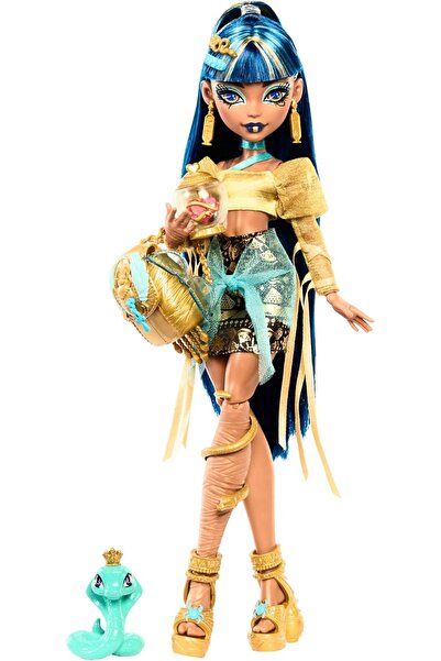 MONSTER HIGH دمية كليو دي نيل ببلوزة ذهبية وتنورة متعددة الطبقات، تتضمن حيوان...