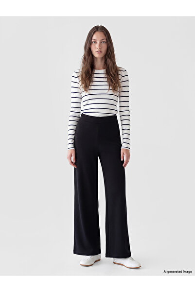 LC Waikiki Nevavm Farkıyla Lcw Modest Black Interlock Plain Narrow & Slim Wom...