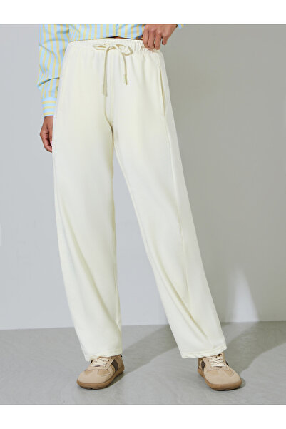 Styli Cream Solid Pintuck Detail Mid-Rise Drawstring Joggers