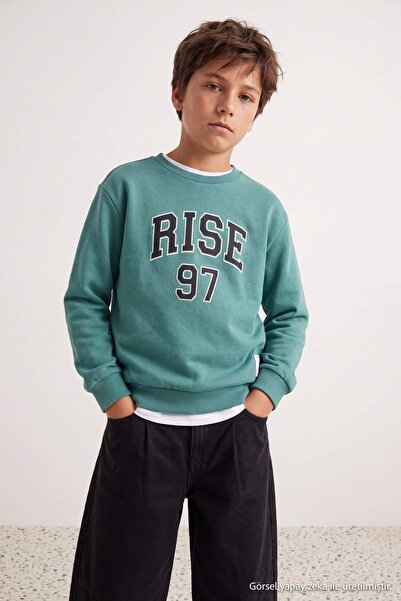 TRENDYOLKIDS سويت شيرت محبوك مطبوع للأولاد من مينت TKDAW27SW00052