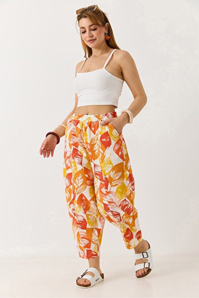 Juuuj Orange Leaf Patterned Woven Fabric Comfortable Carrot Cut Trousers with...