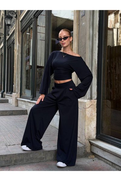 vipelmoda طقم من قطعتين بأكمام فضفاضة وكتف واحد مكشوف