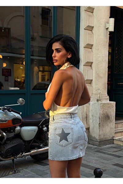 GLAMMOSS L'Atelier تنورة دينيم مزينة بالنجوم وتفاصيل من الكريستال
