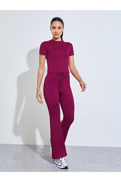Styli Burgundy Solid Fitted T-Shirt And Flared Pants Active Set