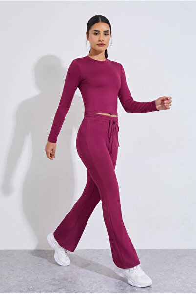Styli Burgundy Solid Long Sleeves Crop Top And Flared Leggings Active Set