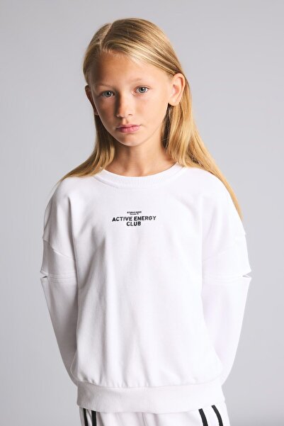 DeFacto Relaxed Fit Crew Neck Printed Sweatshirt with Sleeve Cut-Out Detail f...