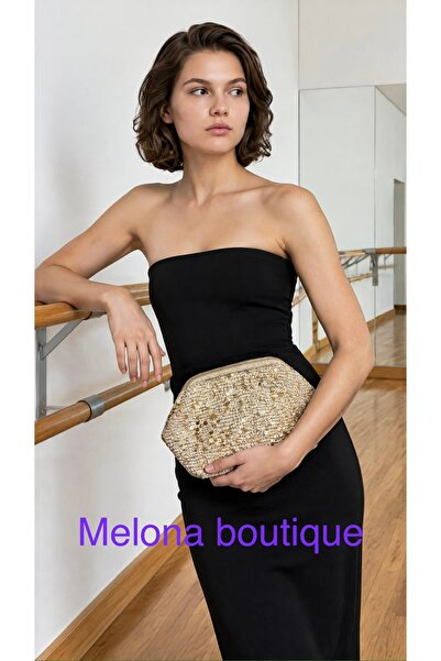 Melonndesign حقيبة كلاتش مزينة بالترتر من ميلونا بوتيك
