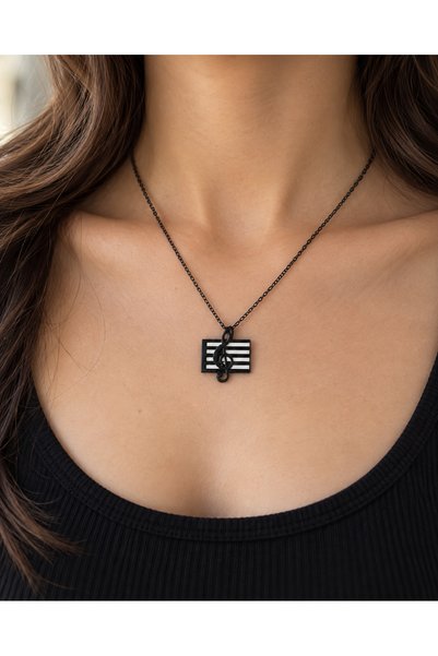 HER ŞEY NOTA www.herseynota.com Black Necklace with a Treble Clef Figure – St...