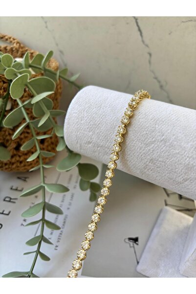 Zirkon taşlı gold