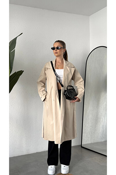 asfamoda معطف نسائي كريمي اللون بحزام وياقة مزدوجة الأزرار وأكمام طويلة مع بط...