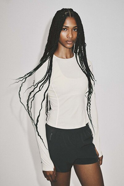H&M Slim Fit Reflective sports top with DryMove™