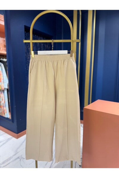 By Zeynep Yılmaz Front Stitched Crepe Ankle Pants Beige