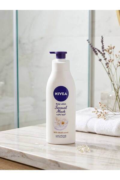 NIVEA لوشن مرطب للجسم للبشرة العادية إلى الجافة، برائحة المسك المثيرة، 400 مل