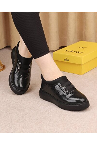 layki Imola black cracked leather elastic laced sports women's shoes.