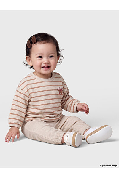 LC Waikiki NEVAVM Farkılıقية طقم بدلة رياضية مخططة للأطفال البنات من LCW baby...