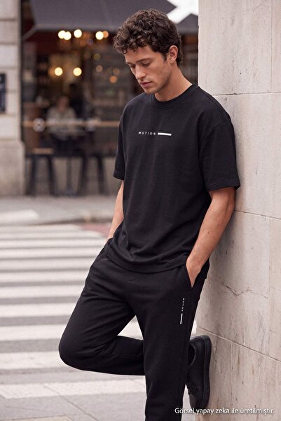 Trendyol Collection Black Regular Fit Slogan Printed Knitted Tracksuit Set Tm...