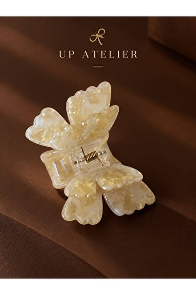 Up Atelier مشبك مزلاج على شكل فراشة بيرليسسينت