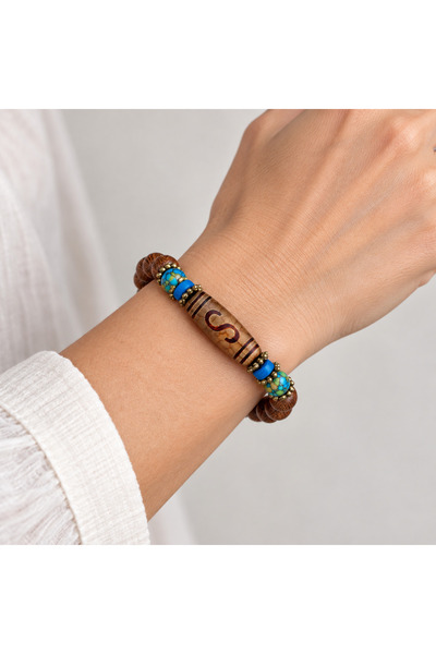HER ŞEY NOTA www.herseynota.com Wooden Look Beaded Curved Ethnic Motif Bracel...