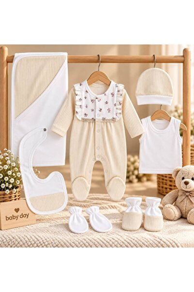 Baby day طقم استقبال مواليد بناتي فاخر 7 قطع مضلع مع صدرية بنقشة زهور وكرانيش...