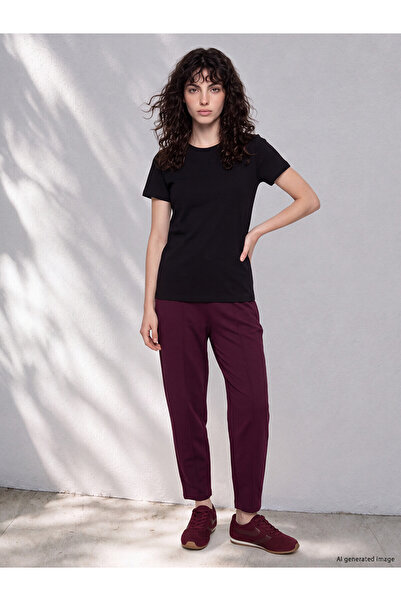 LC Waikiki بنطلون رياضي نسائي فضفاض وواسع من قماش LCW Petite Burgundy Diver ع...