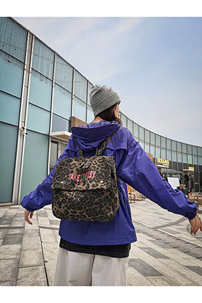 Take Two By Styli Leopard Print Canvas Backpack with Take It Easy Slogan