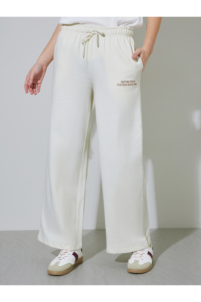 Styli Off White Slogan Print Wide Leg Joggers