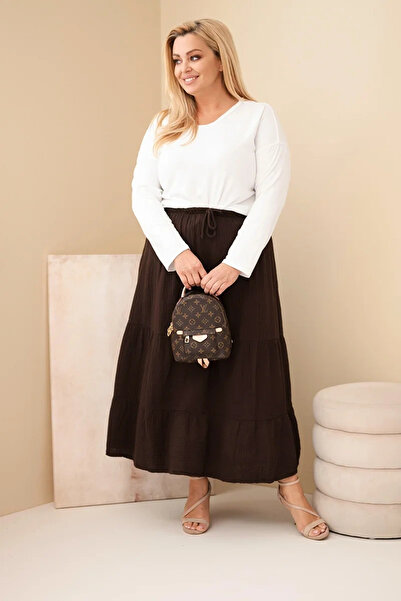 Kesi Fustă maro de damă, mărimi mari, din muselină, cu volane și bandă elastică.