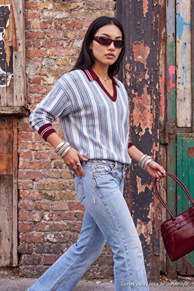 Trendyol Collection سترة تريكو كبيرة الحجم ذات ياقة بولو مخططة وملونة باللون ...