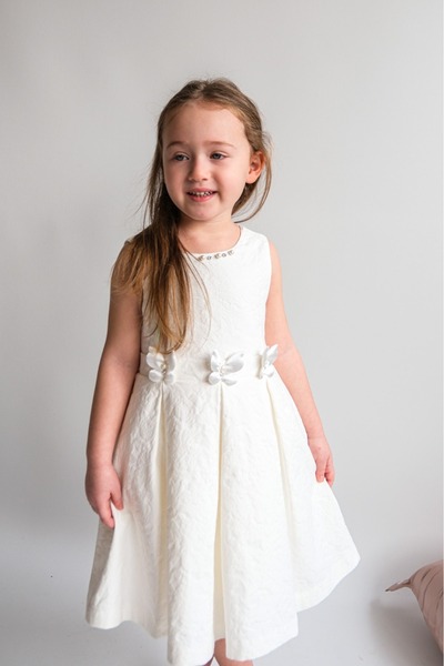 Cumino Girls' White Sleeveless Dress with Embossed Flowers and Butterflies