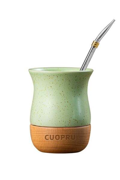 Generic Ceramic cup on wooden base with straw brush, mate tea cup, coffee cup