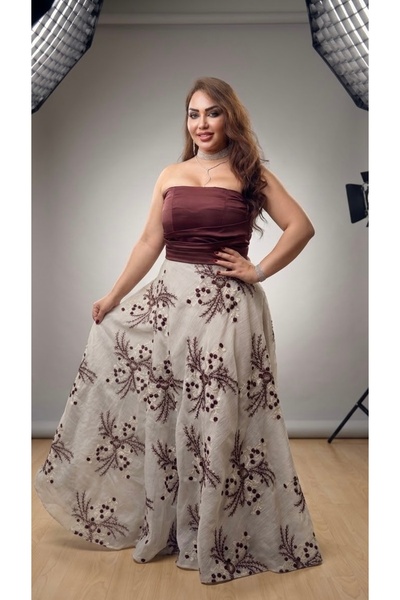 Basmat Saja Salon For Ladies Tailoring فستان سهرة منفوش بدون أكمام كورسية