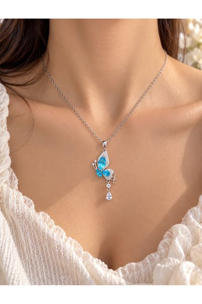 shop IŞIKLI KUTUDA MAVİ SALLANTILI KELEBEK KOLYE ÇELİK