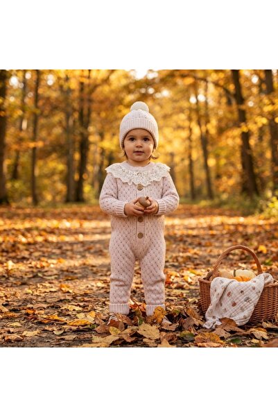 Pure Boutique Powder pink baby jumpsuit made of natural wool with lace collar...